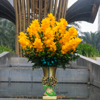 Yellow cymbidium flower arrangement Saigon