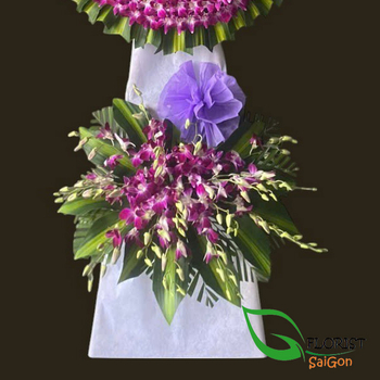 Online cheap condolence flower stand delivery Ho Chi Minh city