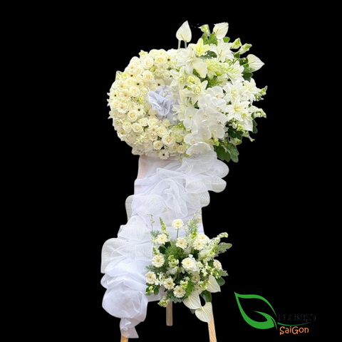 White condolence flower wreath in HCMC