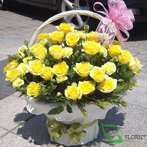 Basket of yellow roses