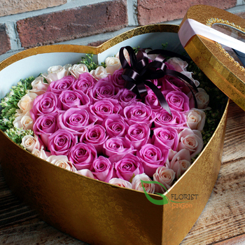 Box of purple roses