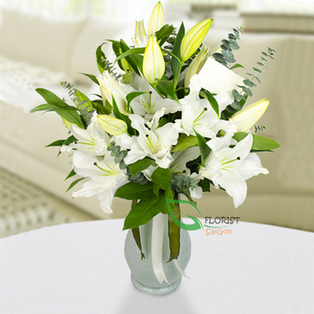 Saigon flowers in a vase with white lilies