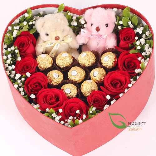 Rose and chocolate and bear in a box