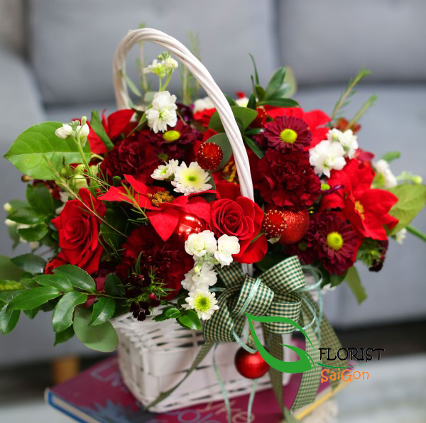 Poinsettia and rose arrangements