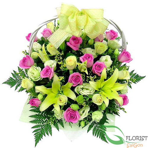 Basket of pink roses and yellow lilies