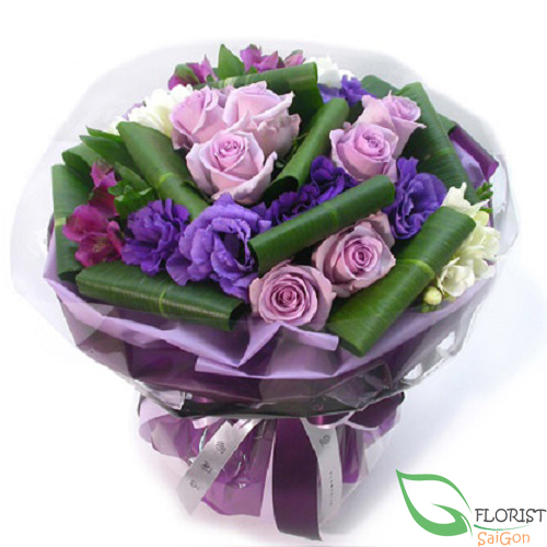 Purple roses and violet lisianthus flower bouquet