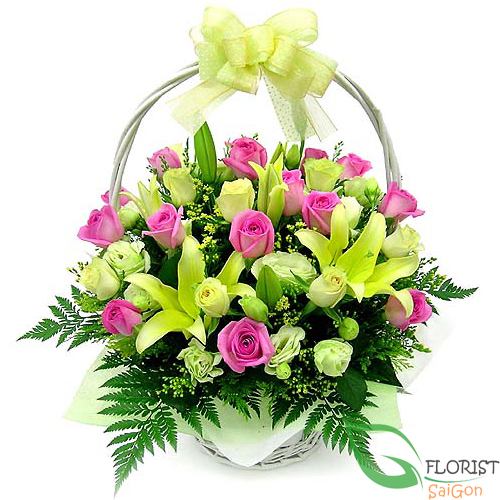 Basket of pink roses and yellow lilies