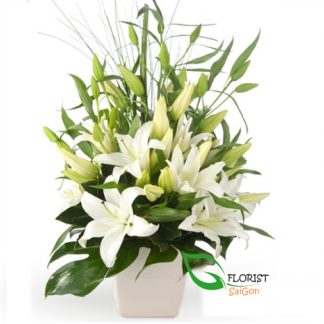 Christmas lily arrangement