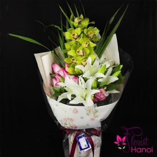 Flower bouquet with orchid and lilies