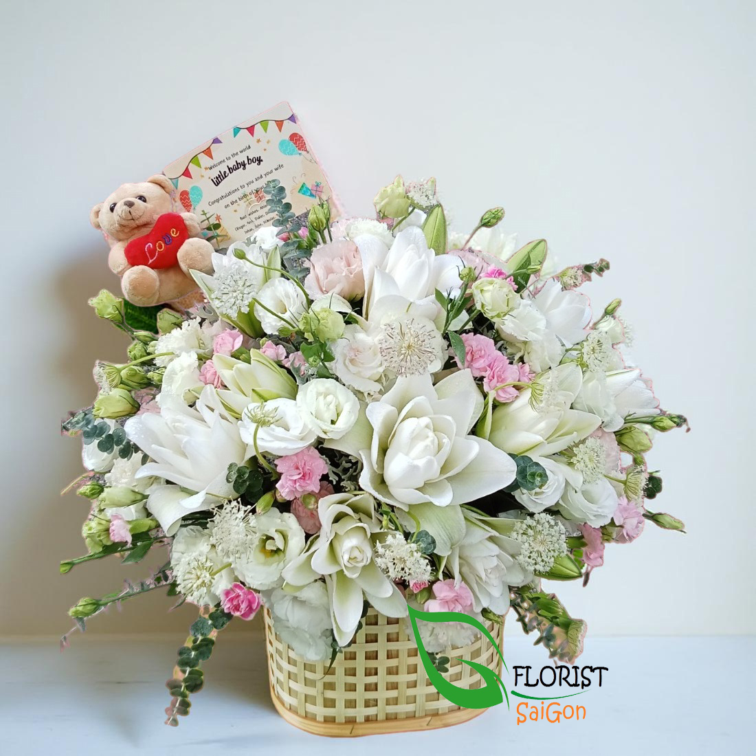 White lily flower arrangement for new baby
