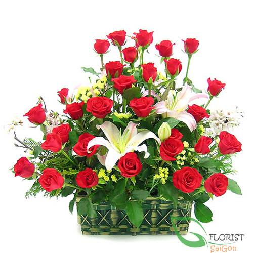 Mixed lily and rose arrangement