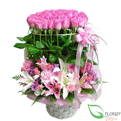 Special arrangement of pink roses and pink lilies