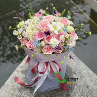 Pink roses birthday bouquet with seasonal flowers in Saigon