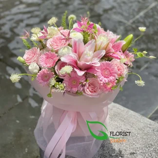 Pink and white birthday bouquet with roses, lilies and gerberas in Saigon