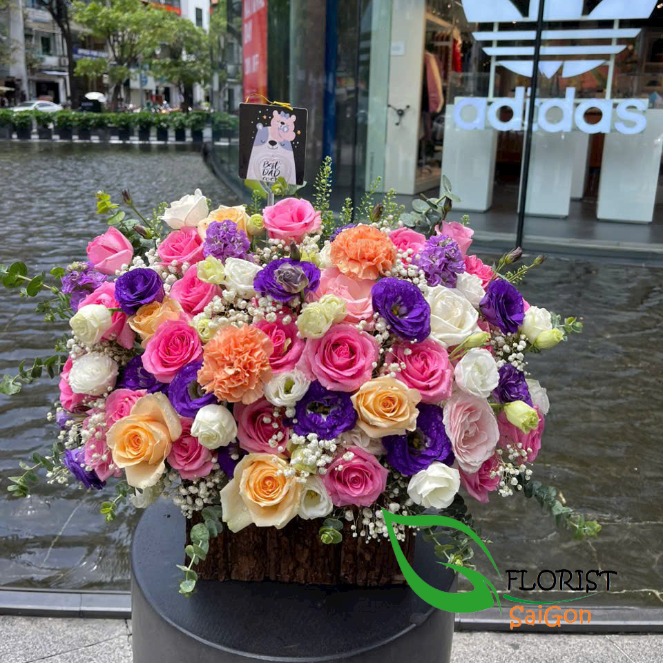 Multi colored rose arrangement for birthday